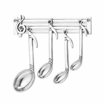 Un set di cucchiai a forma di note musicali