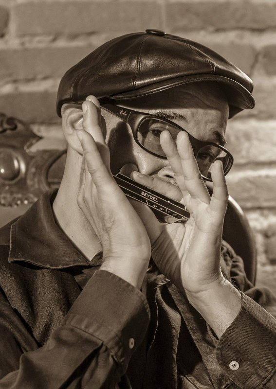 Paolo Demontis playing blues harmonica